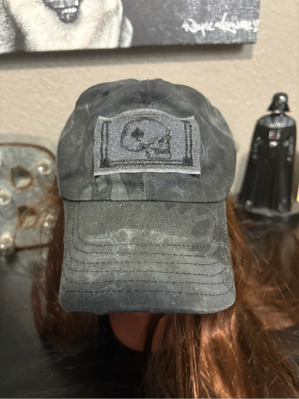 Rogue, American camo baseball cap with skull patch. One size adjustable.